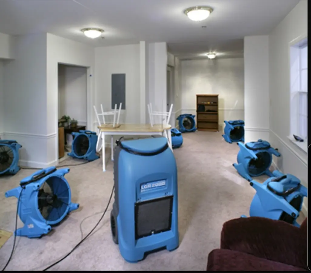 Air movers and dehumidifier setup for Water Damage Restoration in Mount Holly